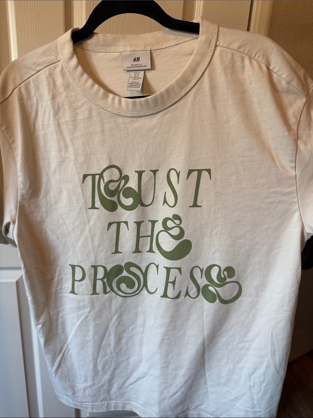 E14 H&M White Tee with Sage Green "Trust The Process" Graphic